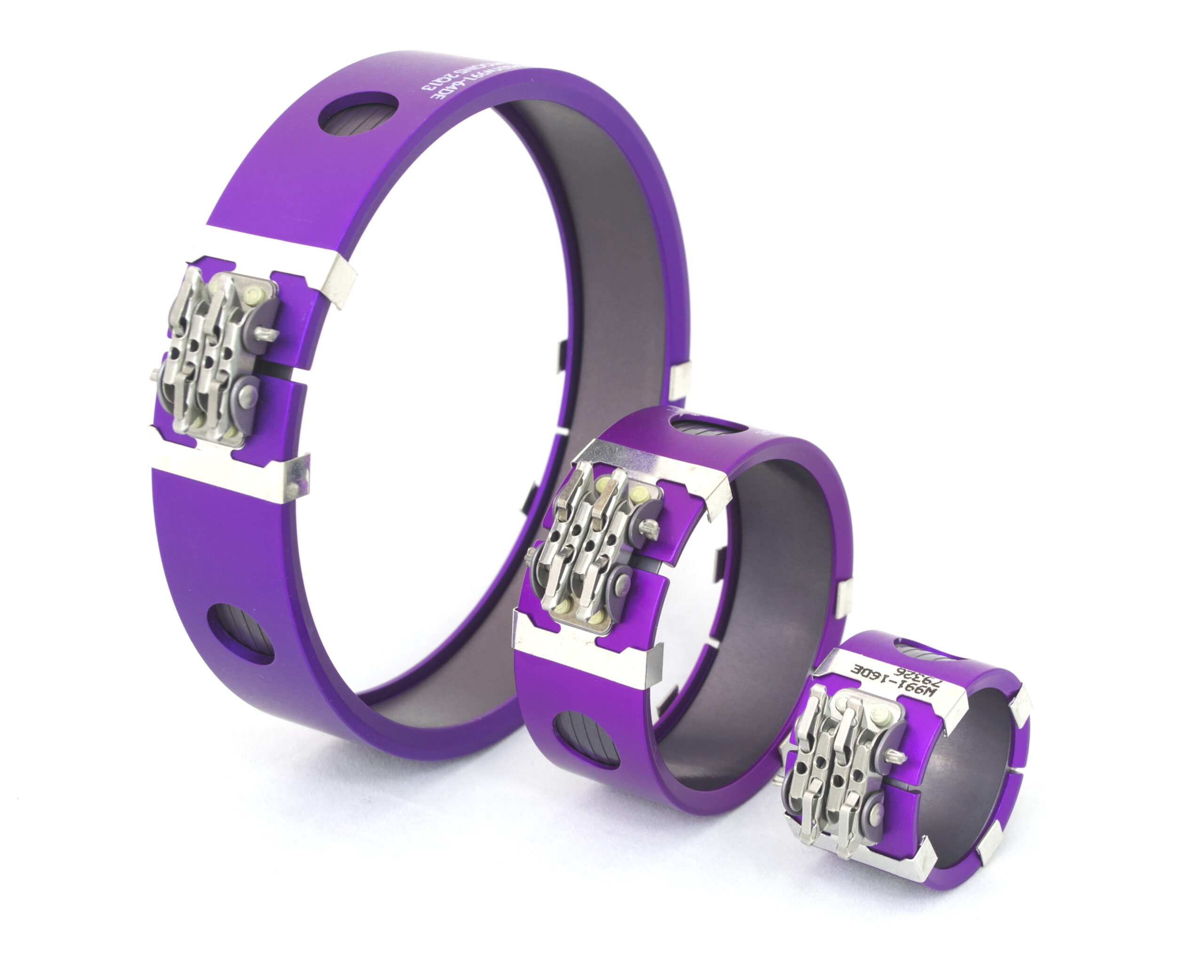 three purple performance wristbands with numerical combination locks on a white background.